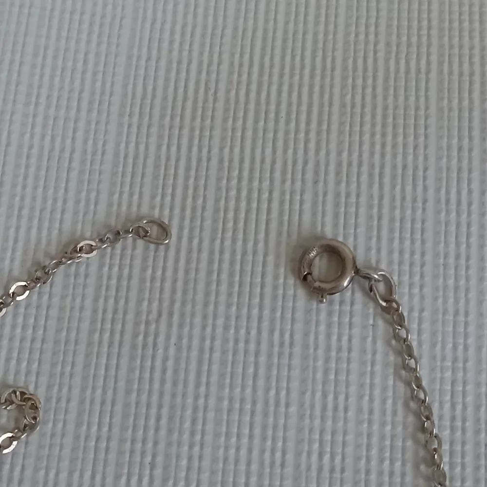 Round Etched Windmill Pendant Single Strand Gold Tone Chain Lightweight Necklace